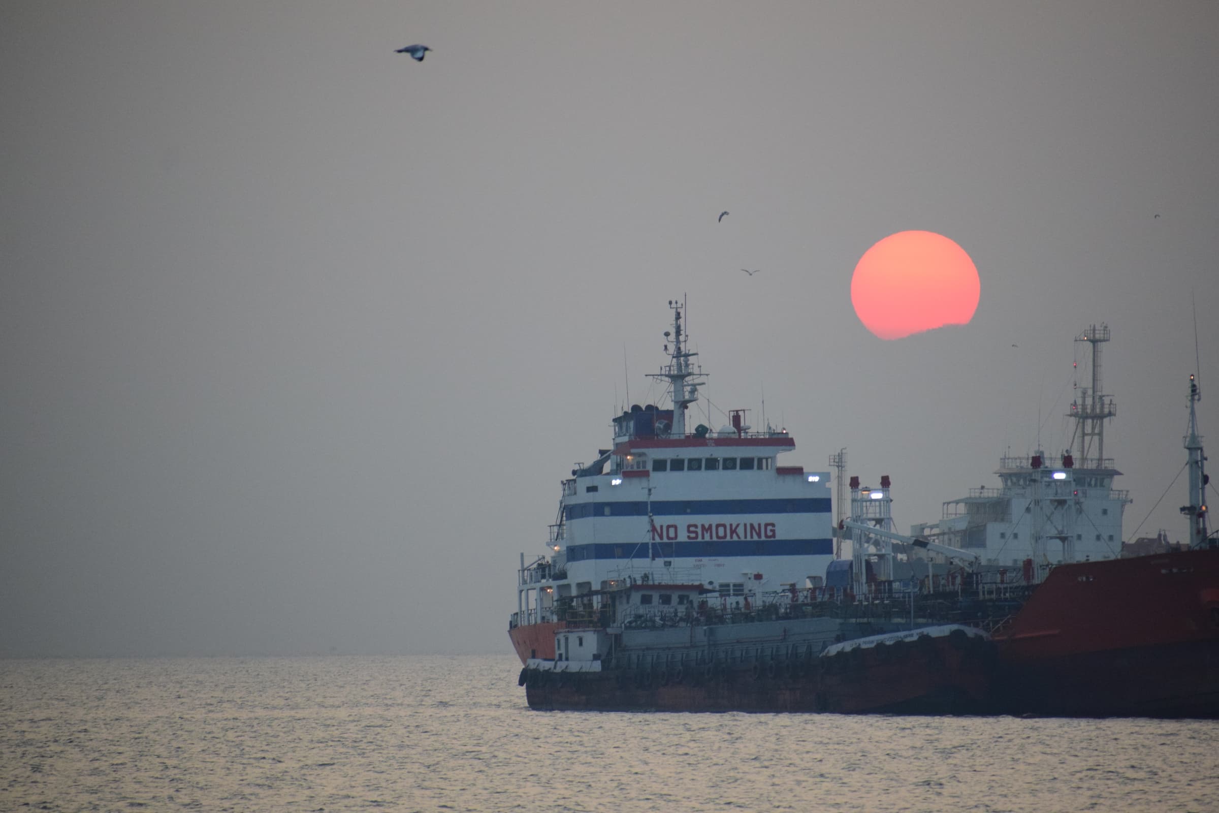 Cargo Vessel at Sunset Harbor
